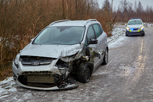 January 17, 2023, Riga, Latvia: car after accident on a road because of frontal collision, transportation background