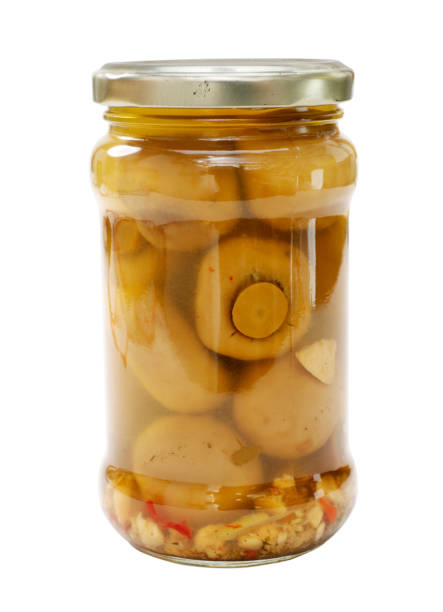 Two glasses of home-made preserves, mushrooms, bolete, for the winter.