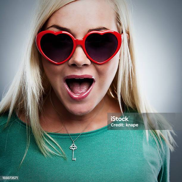 Foto de Mulher Feliz Em Copos Em Forma De Coração e mais fotos de stock de Símbolo do Coração - Símbolo do Coração, Óculos escuros - Acessório ocular, Óculos