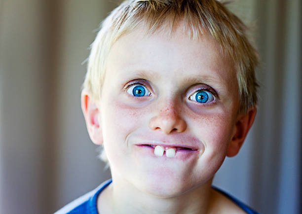 face portrait boy teenager closeup male emotion grimace white caucasian guy