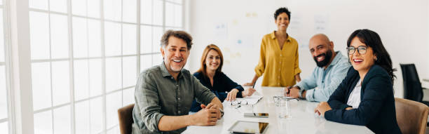 istock Successful business team sitting in a boardroom 1550742796