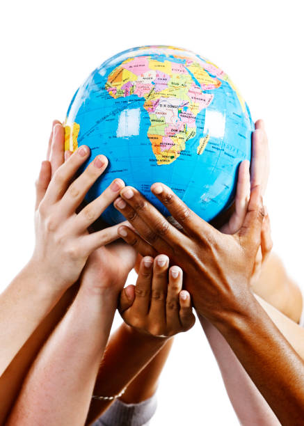 istock Taking care of our world; many hands support geographical globe 155074391