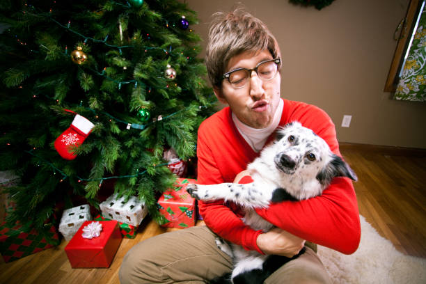 istock Silly Holiday man holding his small dog 155074710