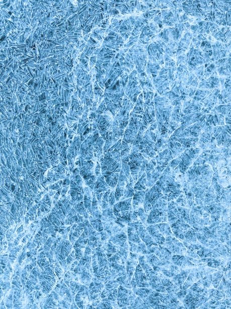istock Abstract Frozen Water Texture with Beautiful Intricate Ice Patterns 1550747718