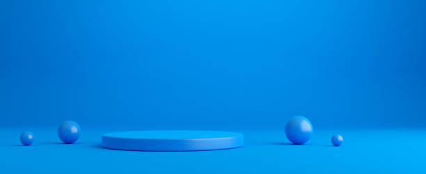 istock Blue round cylinder podium or platform with spheres on white background. 1550751555