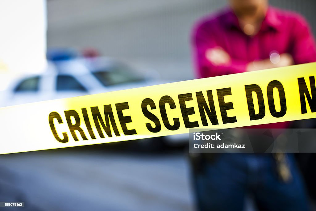 Crime Scene Investigator  Barricade Tape Stock Photo