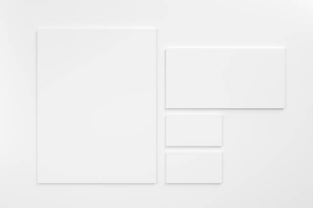 istock White blank stationery mock-up template on white background. Envelope, business cards and A4 paper. 1550752105