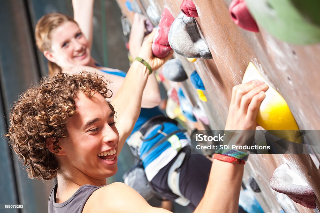 Happy Teenagers Having Fun in a Rock Climbing Gym  Teenager Stock Photo
