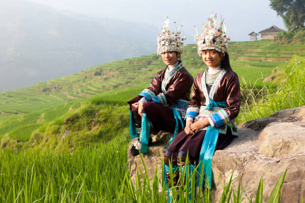 Kaili Leishan Xijiang Miao Village, Guizhou, China surrounded by mountains and rice fields from above