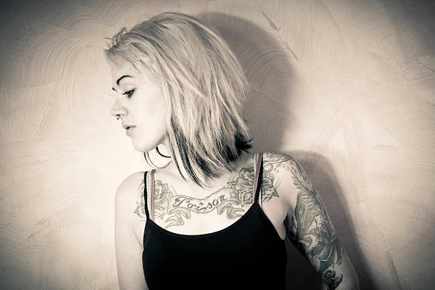 istock Tattooed girl 155075478