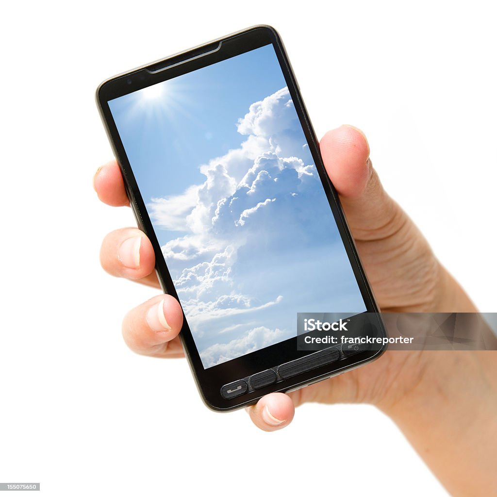 Mano tenendo smartphone con nuvole sullo schermo - Foto stock royalty-free di Arto - Parte del corpo
