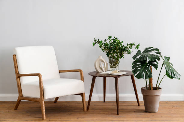 istock Scandinavian living room composition with designer armchair and side table 1550756504