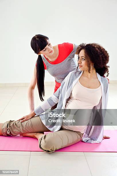 Pregnant Woman With Her Physical Trainer Stock Photo - Download Image Now - African Ethnicity, Coach, Pregnant