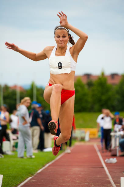istock Female athlete at long jump 155076811