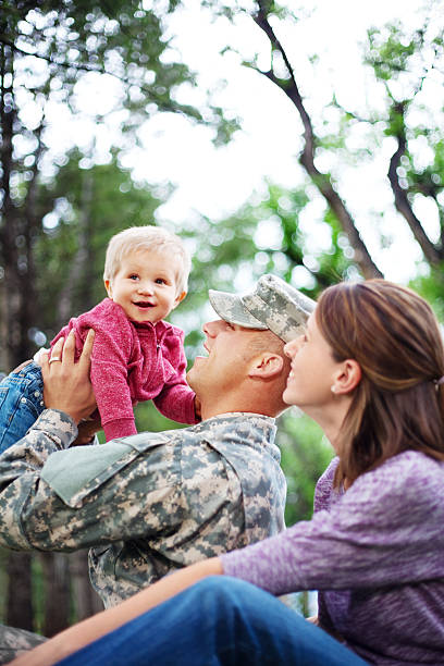 istock Army Family Series: Real American Soldier With Wife & Son 155076901