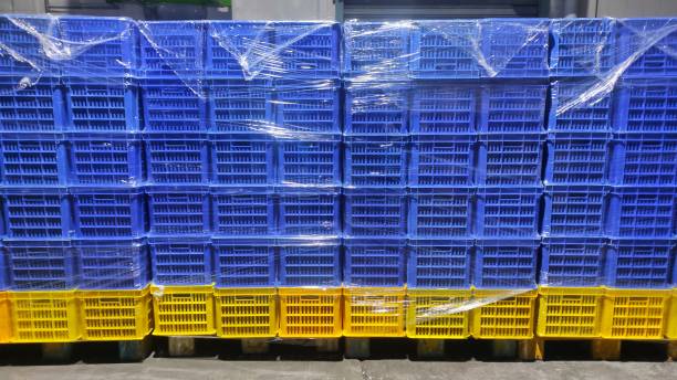 istock Blue and yellow clean basket on the pallet after cleaning process 1550780396
