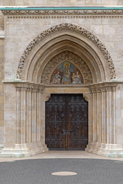 Budapest, Hungary - July 31, 2022: Entrance Doors to King Matthias Late Gothic Roman Catholic Church at Fisherman Bastion First District Historic Landmark.