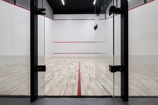 Modern Squash Court Wide Angle View Awaiting Players. Glassy Entrance