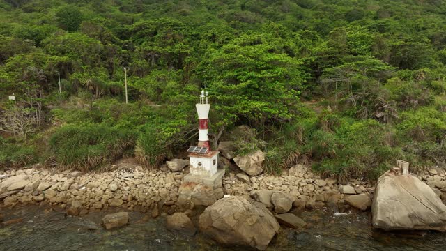 White Stone Lighthouse and blue sea in Con Dao, Con Son island, Ba Ria Vung Tau province