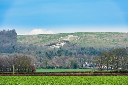 The Crown at Wye near Ashford, Kent, England, carved into the chalk hills.
