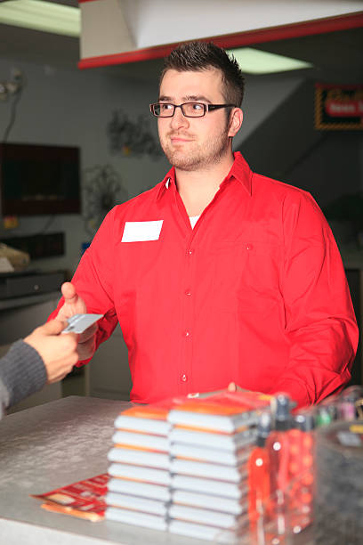 istock Cashier Take Credit Card Hardware Store 155095671