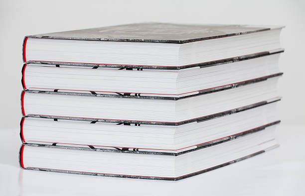 stack of hardcover books stock photo