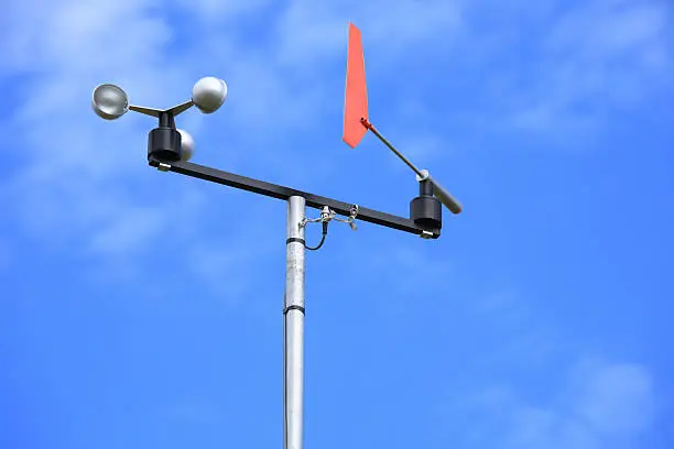 Anemometer against the blue sky