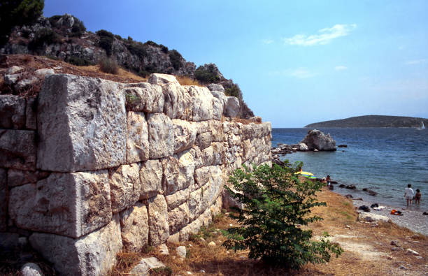 analogue photo of the ancient stone wall of the Assini fortress in Peloponnese