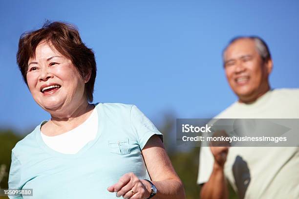 Senior Couple Jogging Stock Photo - Download Image Now - 70-79 Years, Active Lifestyle, Active Seniors