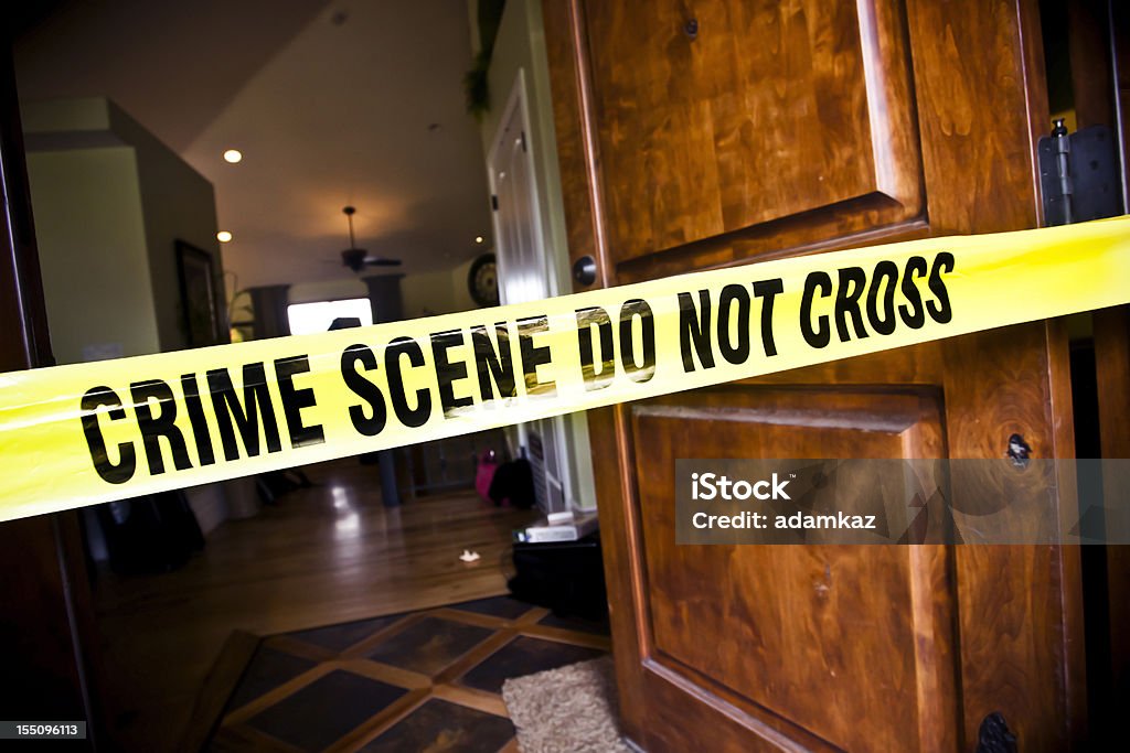 Crime Scene at Residential Home Crime Scene tape at the front door of a luxury home Crime Scene Stock Photo