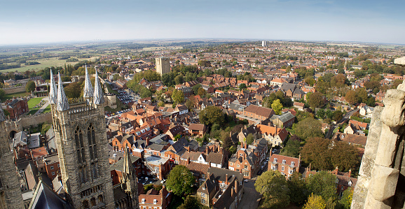 A stunning view of the ancient city of Lincoln, England, taken from the Cathedral bell tower - 272 feet high. (Stitched panoramic image - this image is a composite of smaller sections).