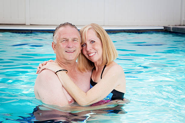 istock Senior couple in the pool 155096380