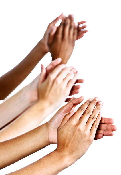 istock Applause as three female hands clap enthusiastically against white 155096472