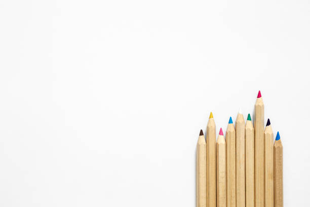 istock Wooden multi-colored pencils on a white background, isolated, top view. 1550965034