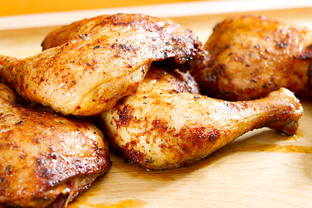 Golden brown barbecued chicken wings stock photo