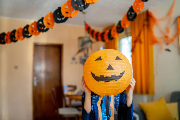 istock Child in Halloween costume 1550968752