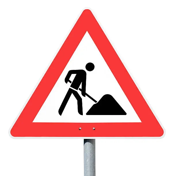 Achtung Baustelle, road construction site, german traffic sign. Isolated on white, clipping path included!