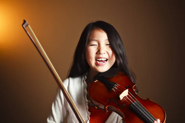 istock Young Asian Violinist 155097015