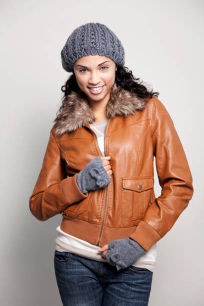 istock Ethnic woman with jacket smiling 155097047