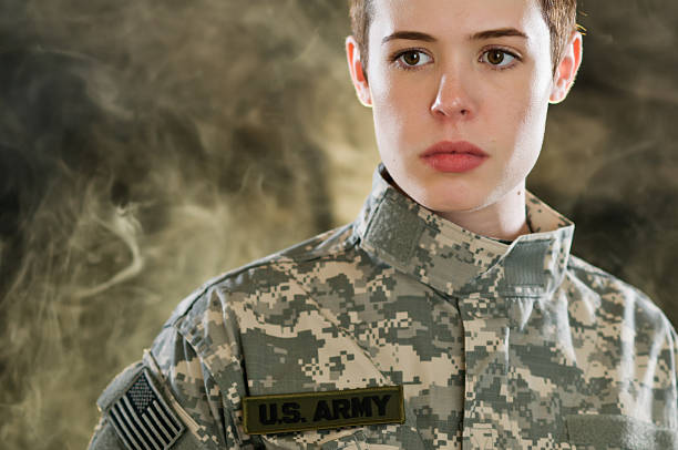 istock Young woman in army camouflage clothes 155097157