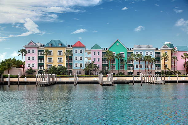 Colorful condominiums on the water Colorful Condominiums in Nassau Bahamas. bahamas photos stock pictures, royalty-free photos & images