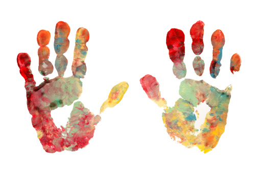 Hands print made with a variety of gouache colors
