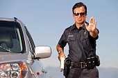Police Officer gesturing Halt