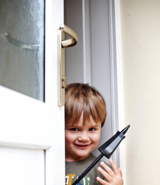 istock Three year old boy portrait open door 155098159