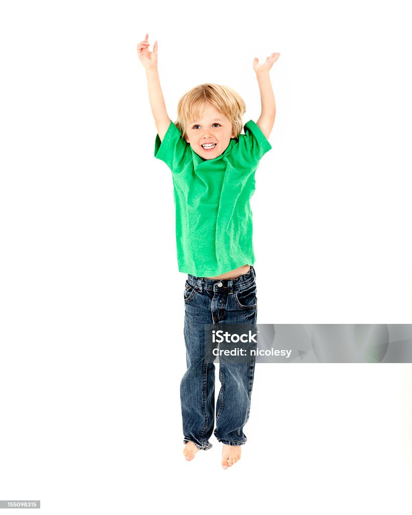 Petit garçon sauter sur un arrière-plan blanc - Photo de Enfant libre de droits