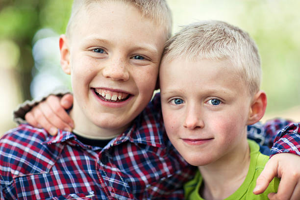 best friends - sibling sweden family smiling стоковые фото и изображения