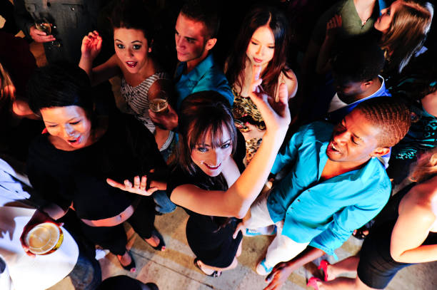 istock Group of People dancing in a bar 155098951