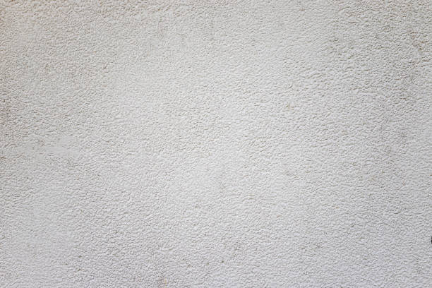 istock White background texture. Wallpaper shape and have copy space for text. Blank concrete wall white color for texture background. 1550990635