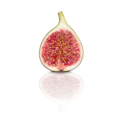 clipping path included. Bisected ripe red and sweet fig.
