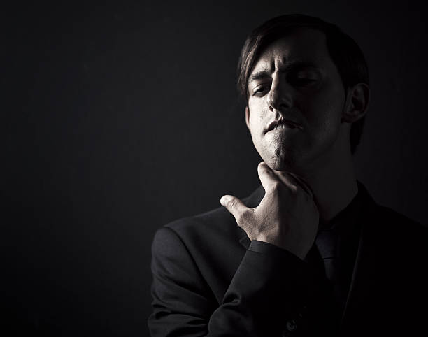 istock italian man making a throat-cutting gesture 155099315